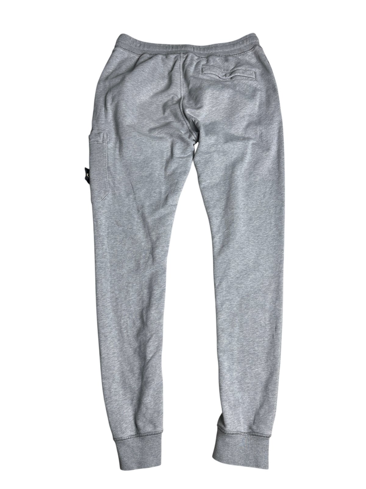 Pantalon de jogging gris vinqo.store en coton avec écusson latéral, vue arrière sur fond neutre.