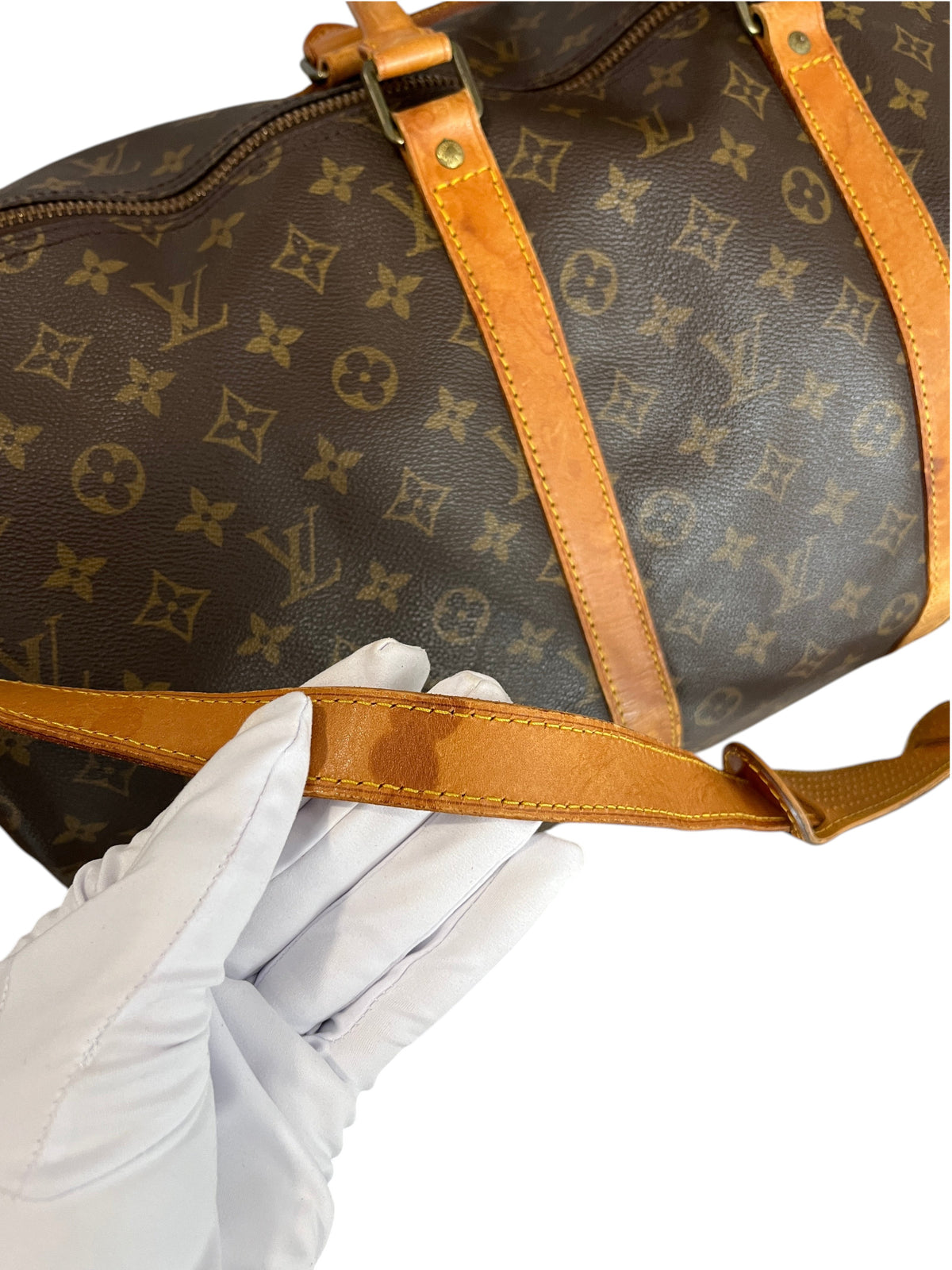 Sac de voyage vinqo.store Louis Vuitton Keepall 55 en toile monogram marron avec bandoulière en cuir patiné