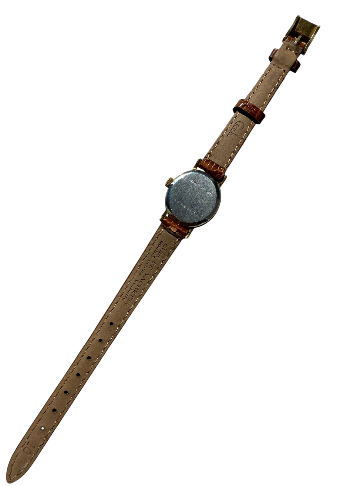 Montre vintage vinqo.store pour femmes avec boîtier plaqué or et bracelet en cuir marron, vue du fond de boîtier.