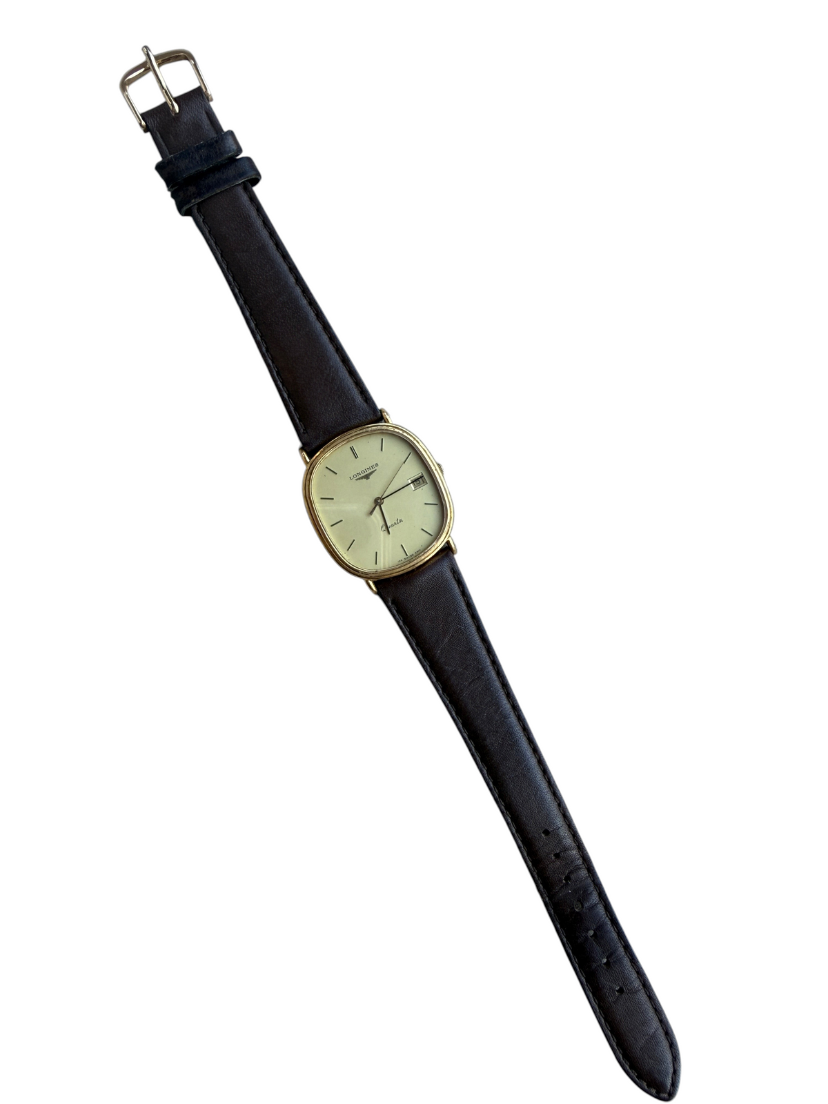 Montre vintage vinqo.store Longines tonneau à quartz, boîtier plaqué or, cadran clair et bracelet en cuir noir