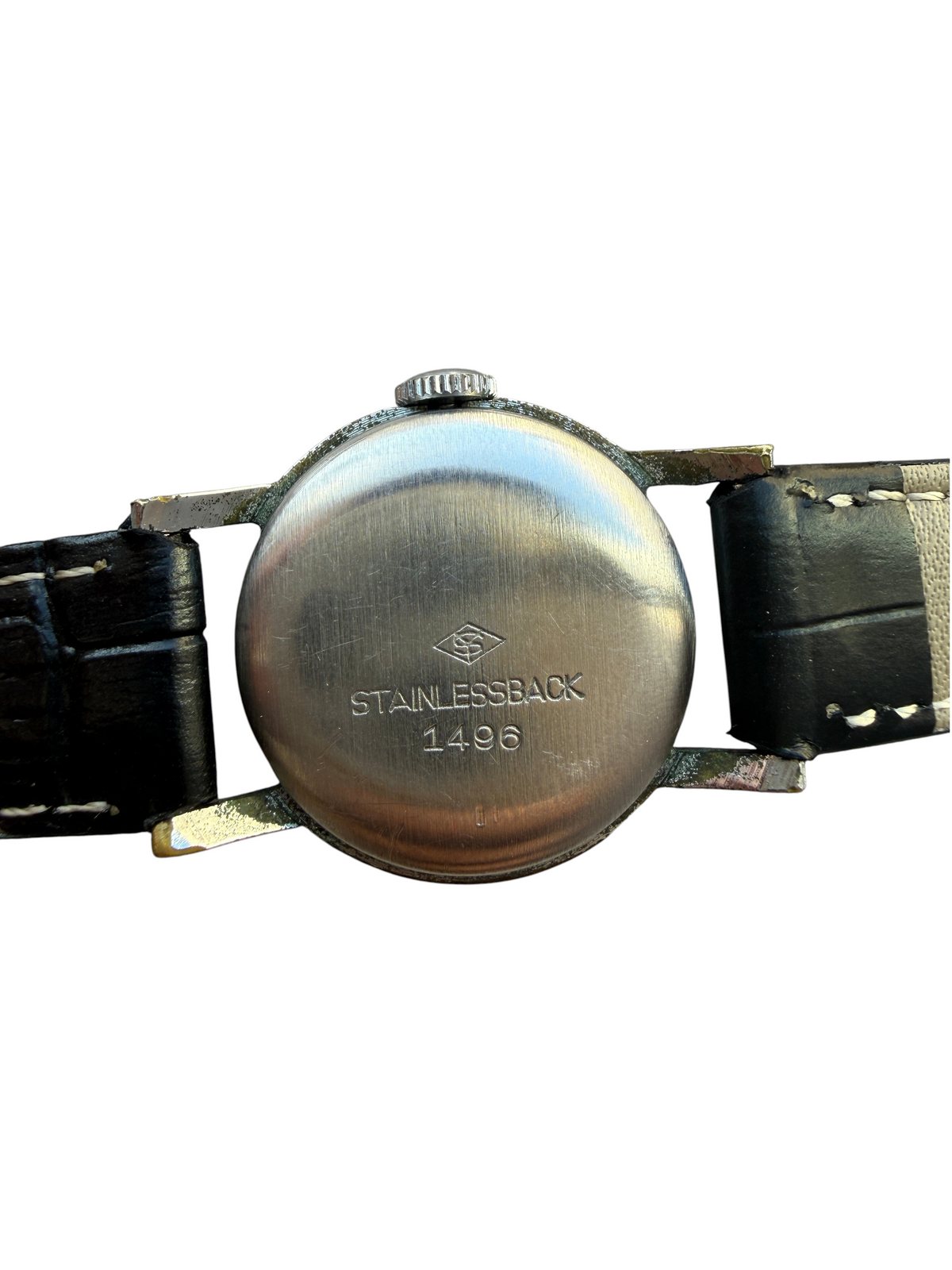 Fond de boîtier en acier inoxydable d'une montre vintage vinqo.store des années 30 avec bracelet en cuir noir