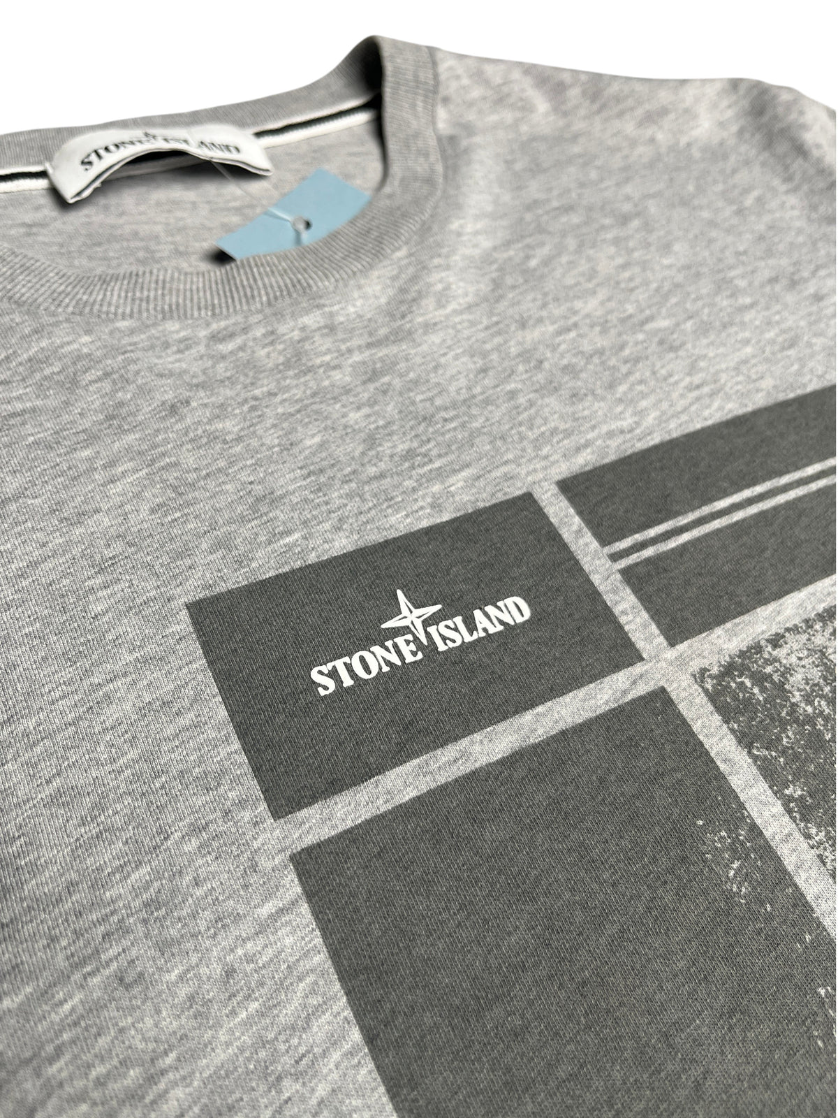 T-shirt gris chiné Stone Island avec logo imprimé sur la poitrine, proposé par vinqo.store